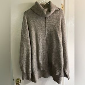 H&M women’s turtleneck beige sweater.